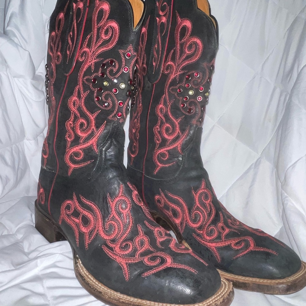 Lucchese Black with red stitching and red crystals.